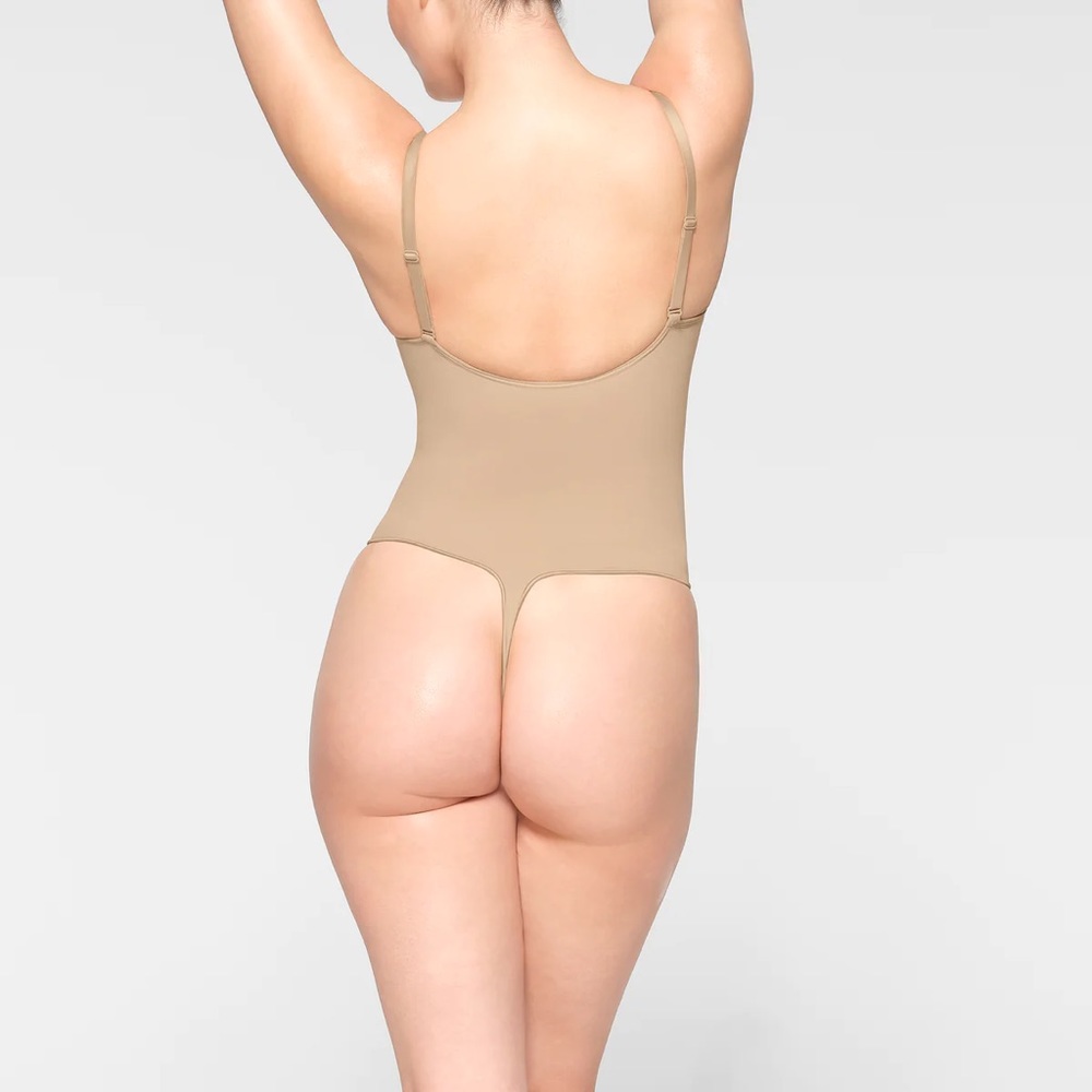 SKIMS Seamless Sculpt Thong Bodysuit | Clay - Picture 3 of 7